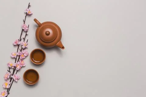 Tea set cherry blossom branch. High quality and resolution beautiful photo .. Photos