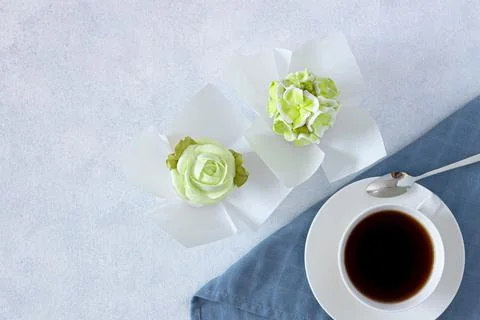 Tea set in a composition with marshmallow flowers. top view, copy of space. C Stock Photos