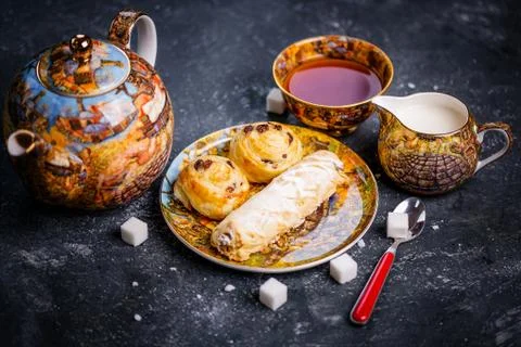 Tea set. Oriental sweets bakery. Top view. Dark background Stock Photos
