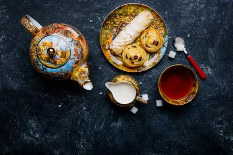 Tea set. Oriental sweets bakery. Top view. Dark background Stock Photos