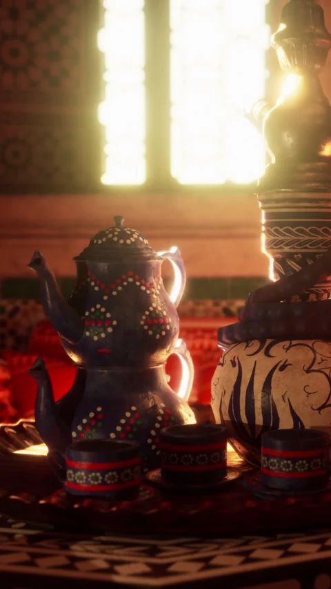 Tea set placed on a table with decorative elements in a warm setting Stock Footage 342337815