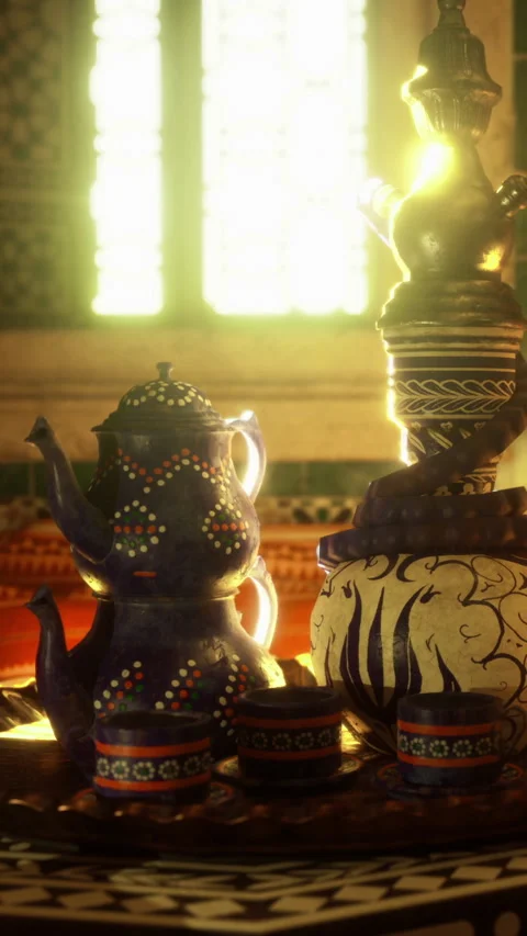 Tea set on a table with sunlight shining through a window in a warm room Stock Footage 331441431