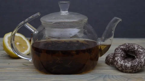 Tea is spinning in the teapot Video stock 178429550