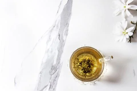 Tea with spring flowers Stock Photos