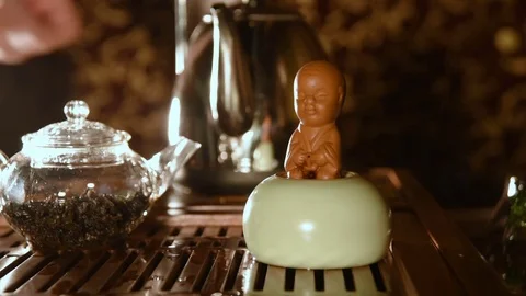Tea statuette made of clay - boy who's peeing Stock-Footage 74450026