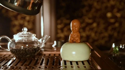 Tea statuette made of clay - boy who's peeing Stock-Footage 74450083