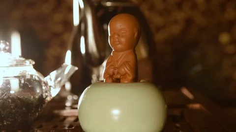 Tea statuette made of clay - boy who's peeing Stock-Footage 74450120