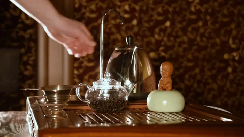 Tea statuette made of clay - boy who's peeing Stock-Footage 74450167