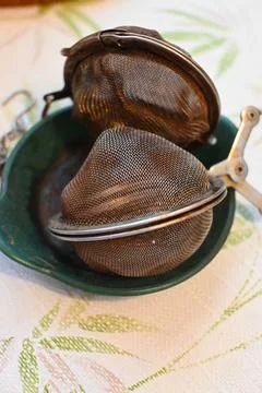 Tea strainers in a bowl Photos