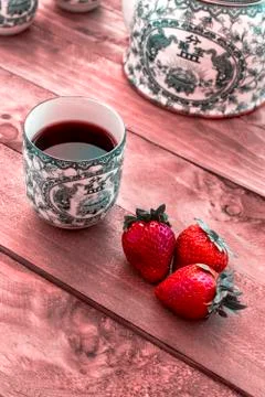 Tea with strawberries Stock Photos