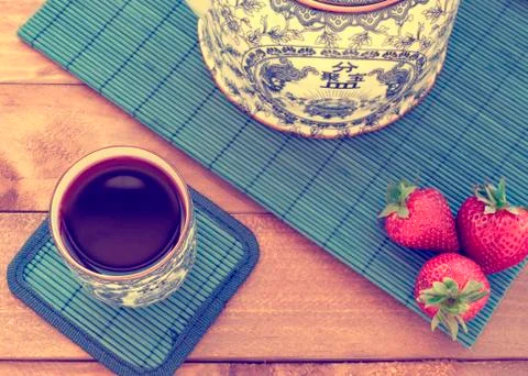 Tea with strawberries Stock Photos