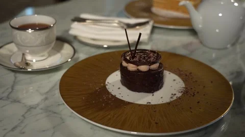 Tea table, a cake, a cup of tea and a teapot 1 Stock Footage 295223053