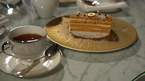 Tea table, a cake, a cup of tea and a teapot 2 Stock Footage 295223057