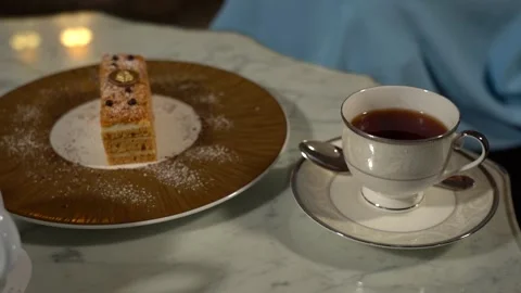 Tea table, a cake, a cup of tea and a teapot 5 Stock Footage 295223121