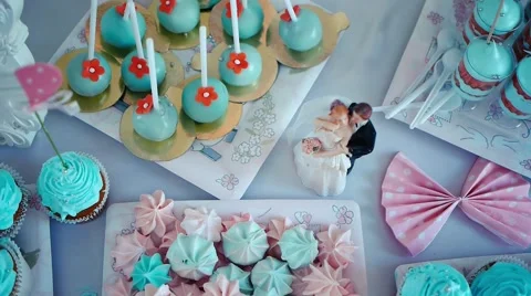 Tea table figurine on cake candy chocolate decor wedding cake bride and groom Stock Footage 61390828