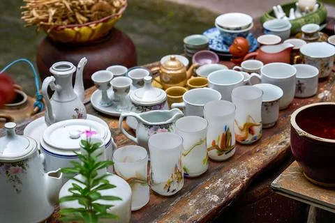 On the tea table in an old Nanning house, a white porcelain teapot was placed Stock Photos