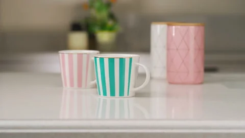 Tea table setting. Tea party concept. Two cups and utensils for tea and sugar Vidéo 173553403