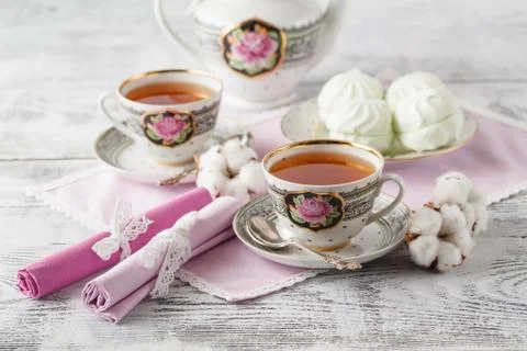 Tea with tea pot on white background Stock Photos