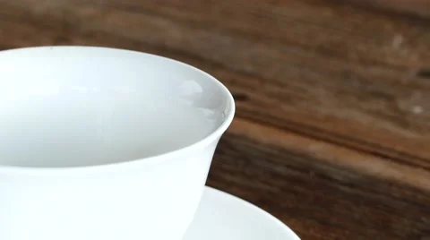 Tea into teacup. Stock-Footage 61396198