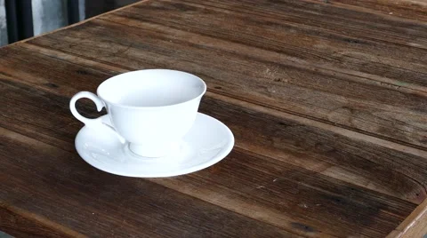Tea into teacup. Stock-Footage 61396351
