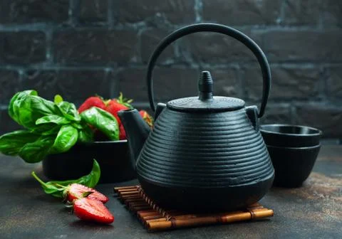 Tea in teapot Stock Photos