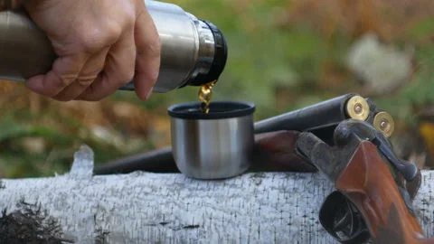 Tea in a thermos on the hunt. Stock Footage 116810010