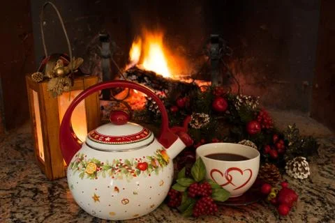 Tea time in front of the fireplace Фото