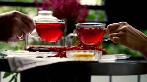 Tea time: hands taking a cup of tea and drinking on the balcony, 120fps Stock Footage 118832215
