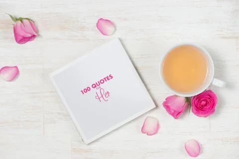 Tea time. Light background with flowers and cup of tea. Stock Photos