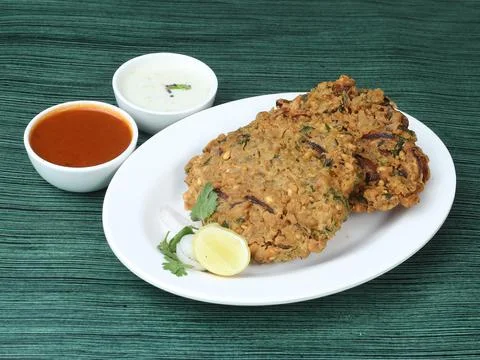 Tea time snack, Dal Vada or Parippu Vada or Paruppu Vadai , deep fried snacks Stock Photos