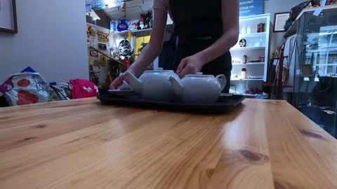 Tea tray being served in Tea rooms Derbyshire UK Stock Footage 141590691