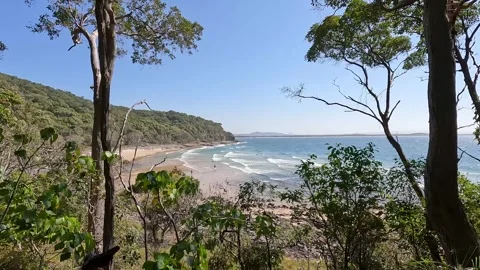 Tea Tree Bay Beach : Scenic Landscape with dramatic sweep of golden sand in.. Stock Footage 284046982