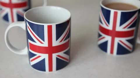Tea in Union Jack mugs Stock Footage 34517265