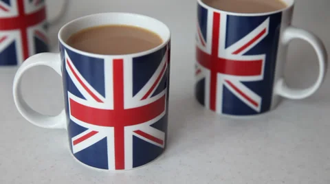 Tea in Union Jack mugs Stock Footage 34517360