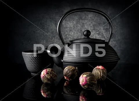 Tea utensil and buds Stock Photos
