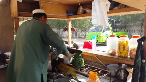 Tea vendor Karachi Stock Footage 132355908