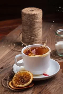 Tea in white cup with sweets Stock Photos