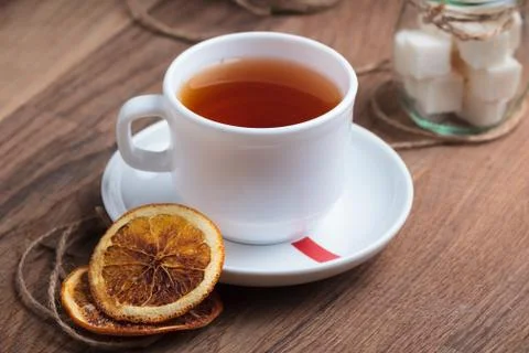 Tea in white cup with sweets Stock Photos