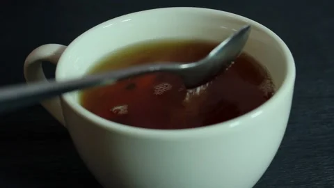 Tea in a white mug. White mug close up. Stock Footage 300488790