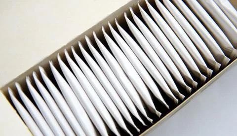 Teabag close-up in tea packaging. Tea bags in a package. Tea box. Breakfast.  Stock Photos