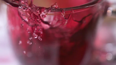 Teabag Drop in Cup  at 1500fps Stock Footage 104847657