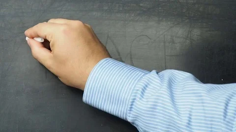 Teach text handwritten on blackboard or chalkboard Stock Footage 70932300