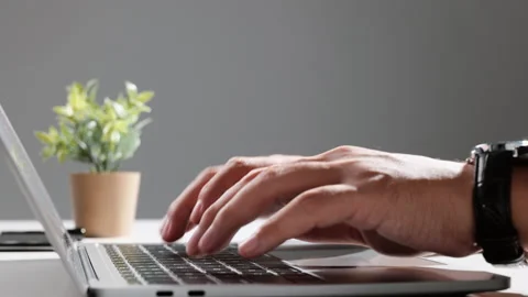 Teacher and computer. Principal or headmaster working in office. Stock-Footage 162707429