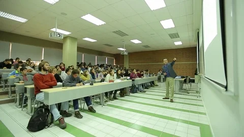 Teacher and powerpoint presentation Stock Footage 77053652