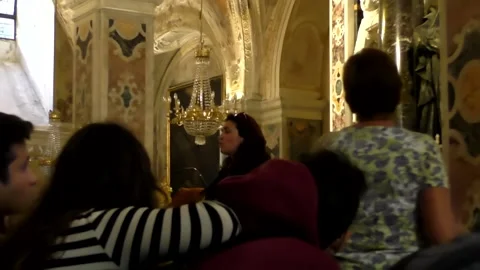 Teacher and student group in Crypt of st Andrew at Amalfi Cathedral Stock-Footage 167637860