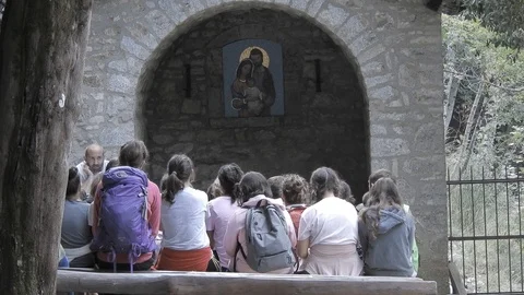 Teacher and students in Assisi (Eremo delle carceri) 4K Italy Stock Footage 111478154