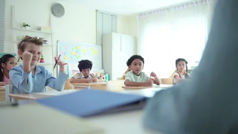 Teacher and students, Learn and study in a classroom of school Stock Footage 282782048
