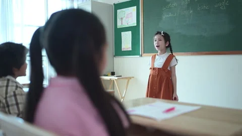 Teacher and students, Learn and study in a classroom of school Stock Footage 283011747