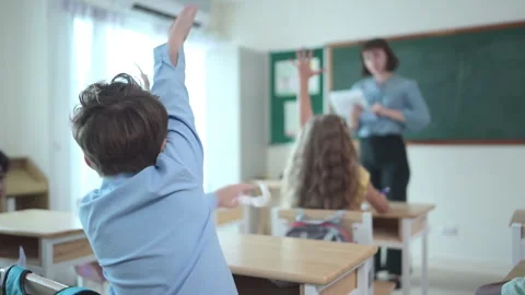 Teacher and students, Learn and study in a classroom of school Stock Footage 283060353