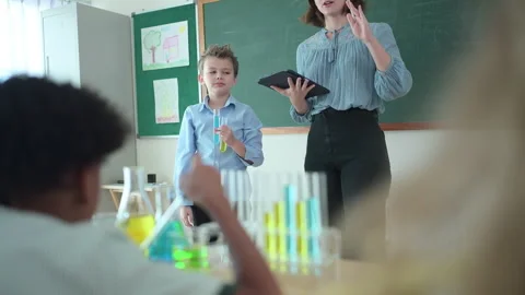 Teacher and students, Learn and experiment with science Video stock 285305650